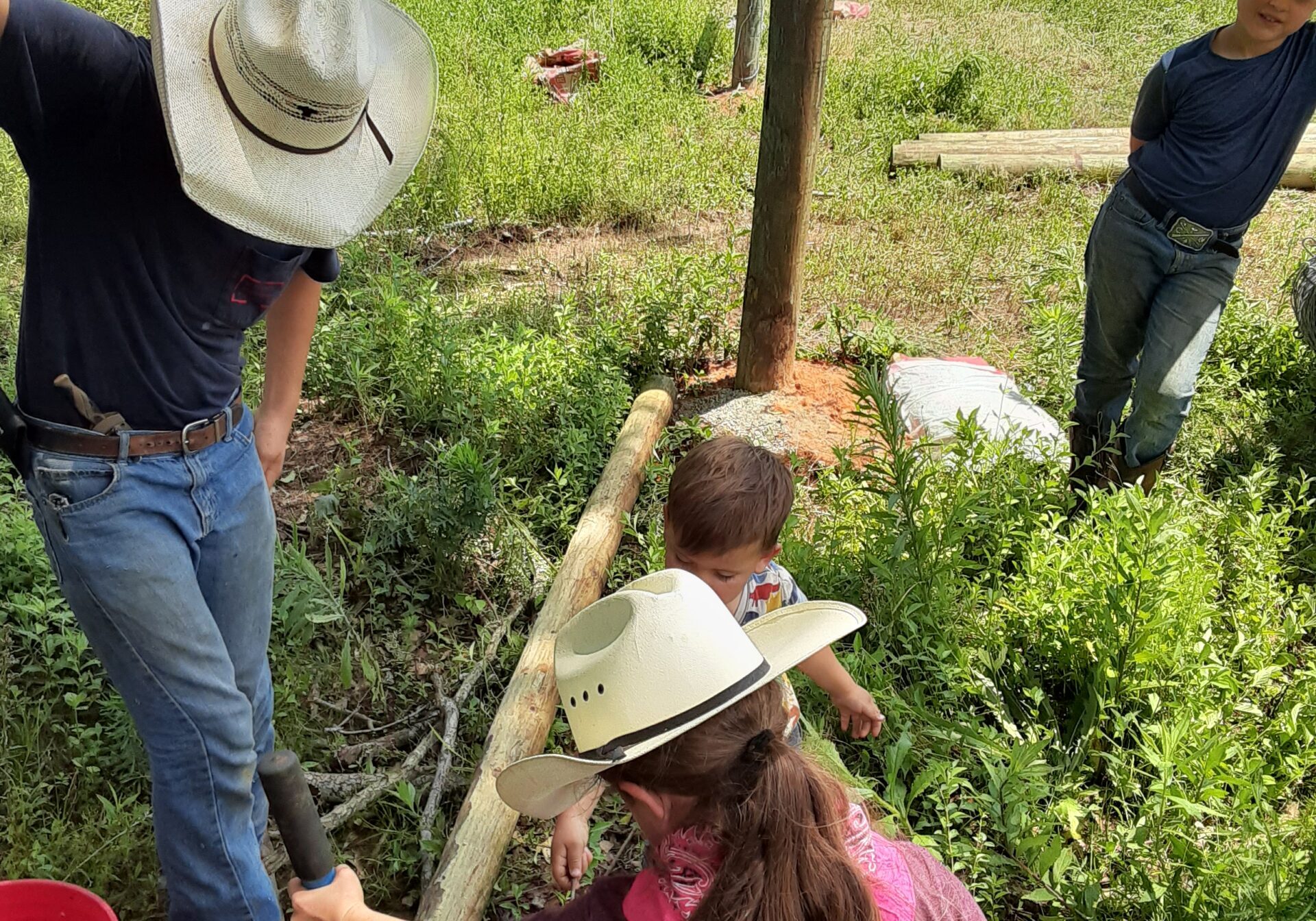 2-kids_working-on-farm